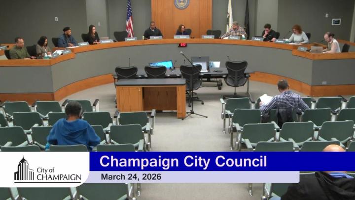 Council Dias with Council Members and audience. 