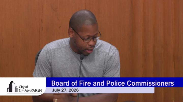 Commissioner at Dais with Graphic for Board of Fire and Police Commissioners and the date July 27, 2026